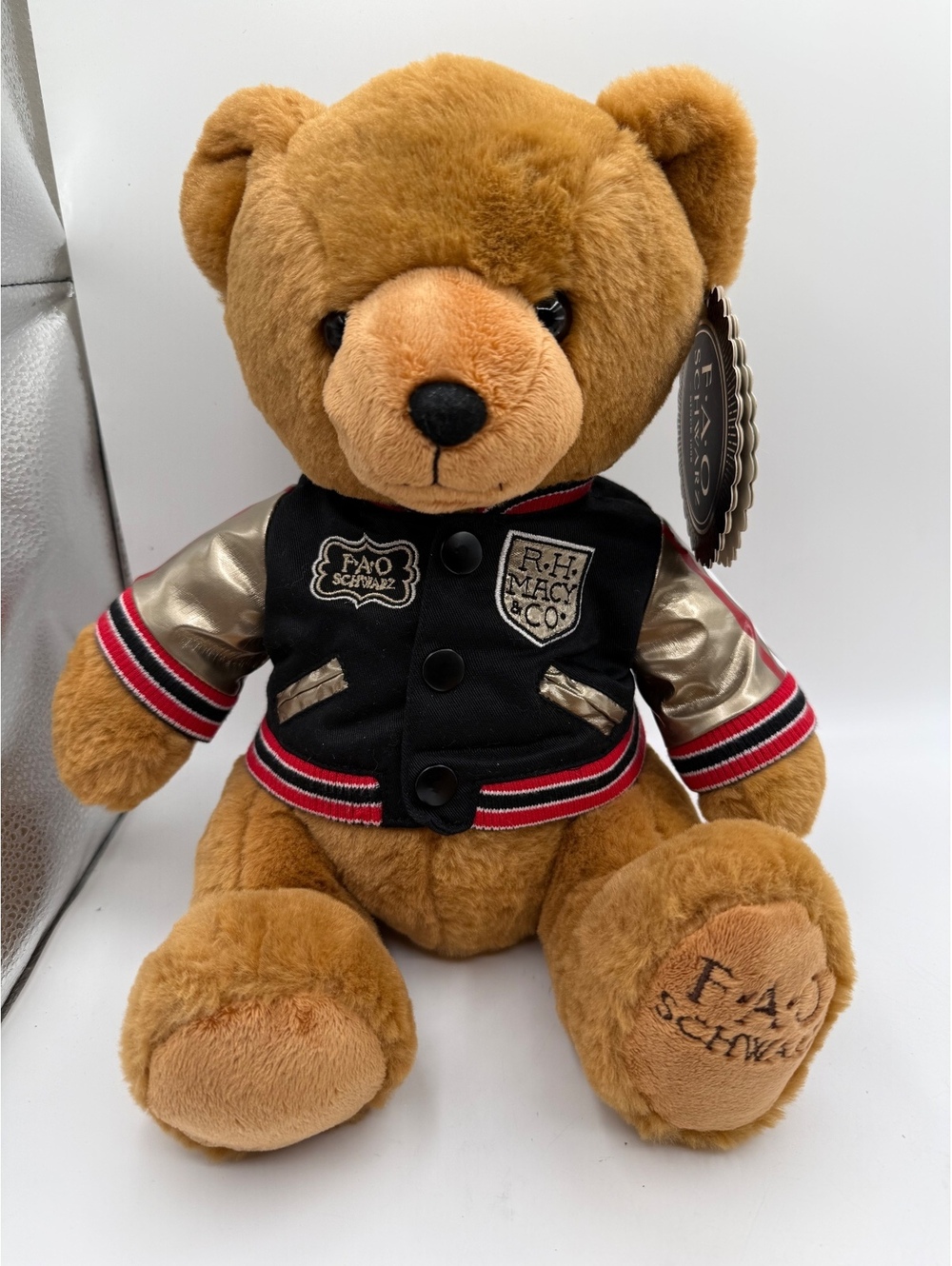 FAO Schwarz Plush Teddy Bear in Black and Gold Varsity Jacket